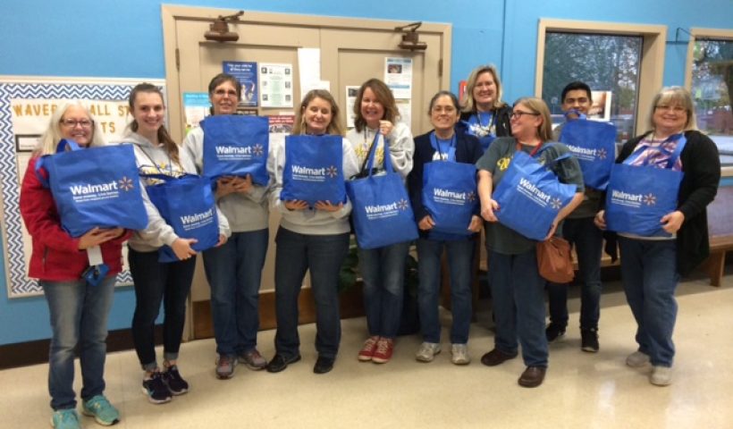 Staff with Walmart Bags