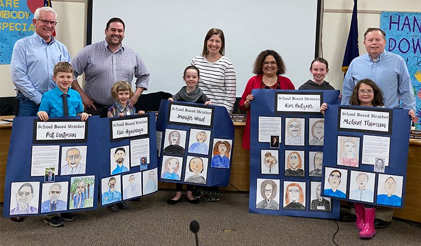 2020 School Board members with students presenting posters